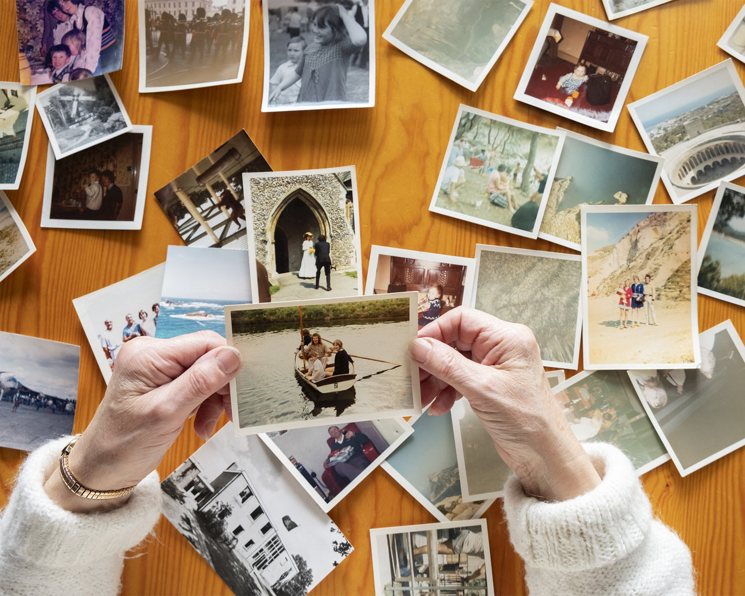 Person holding a photograph