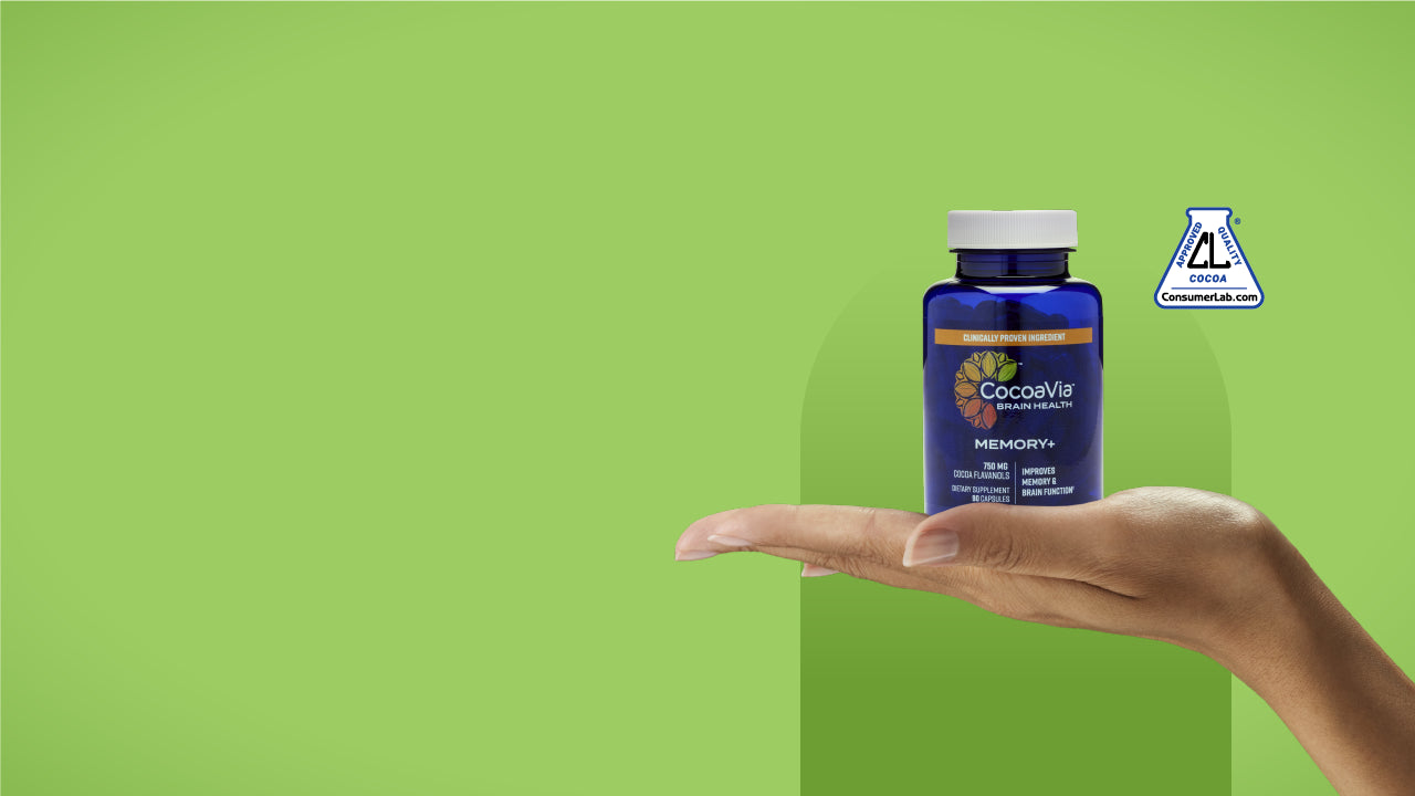 CocoaVia Memory+ Bottle Held by a hand