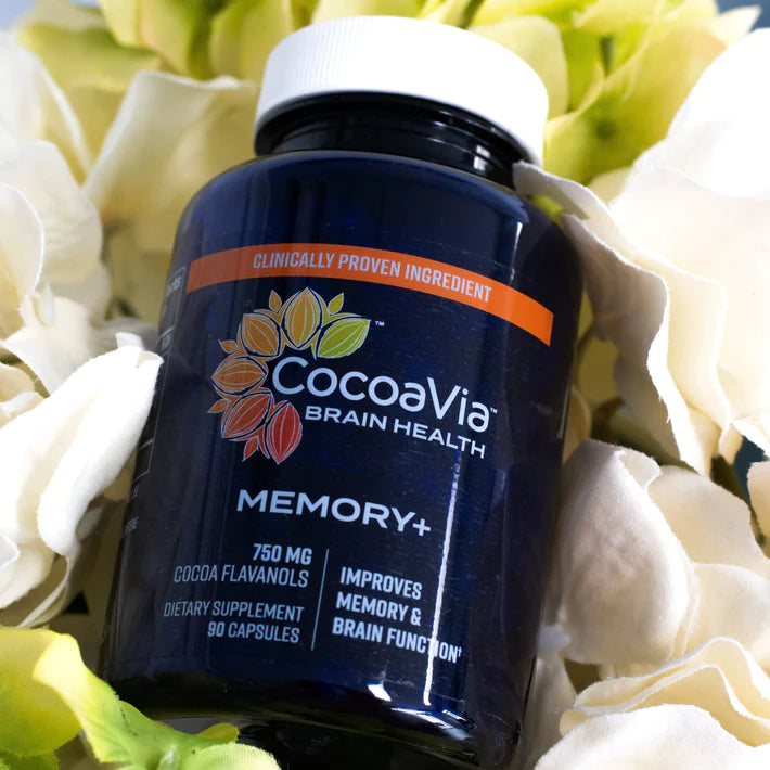 CocoaVia Memory & Focus bottle on top of flowers