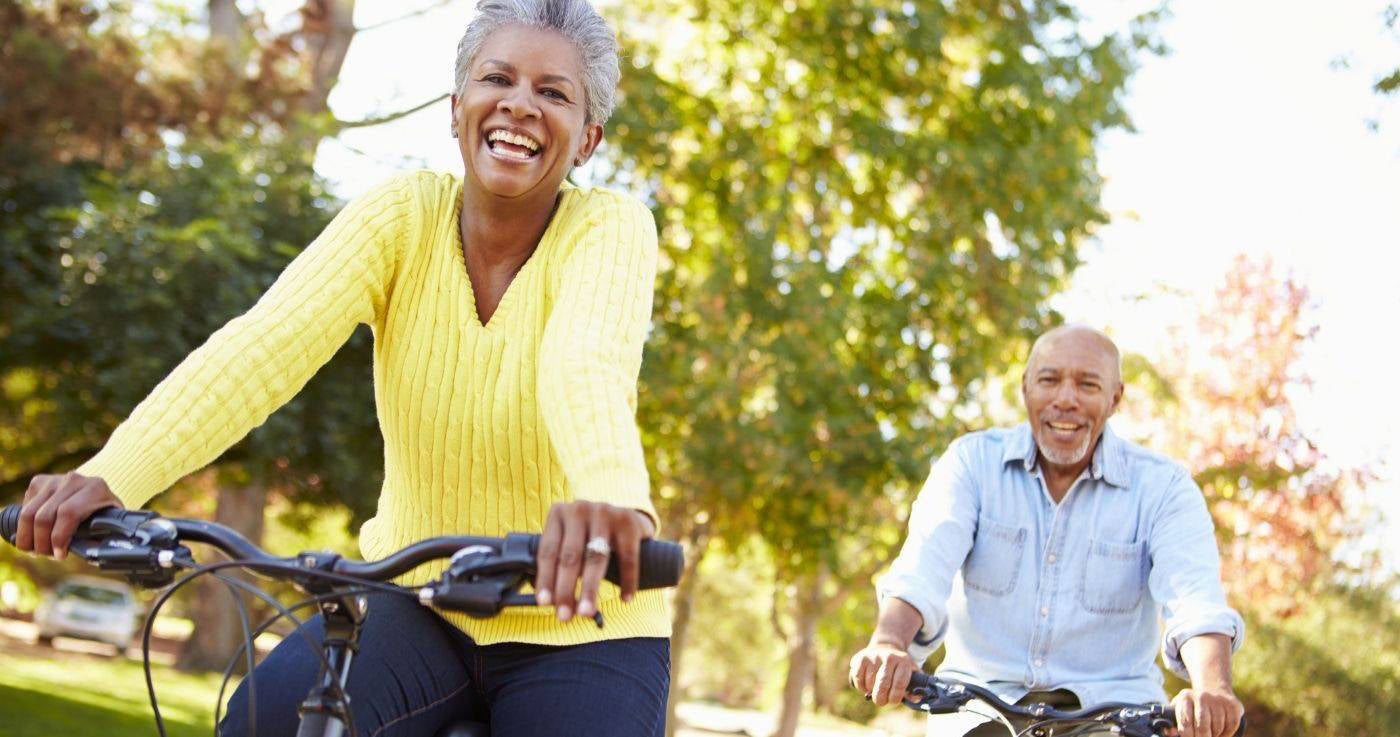 Elderly Couple biking